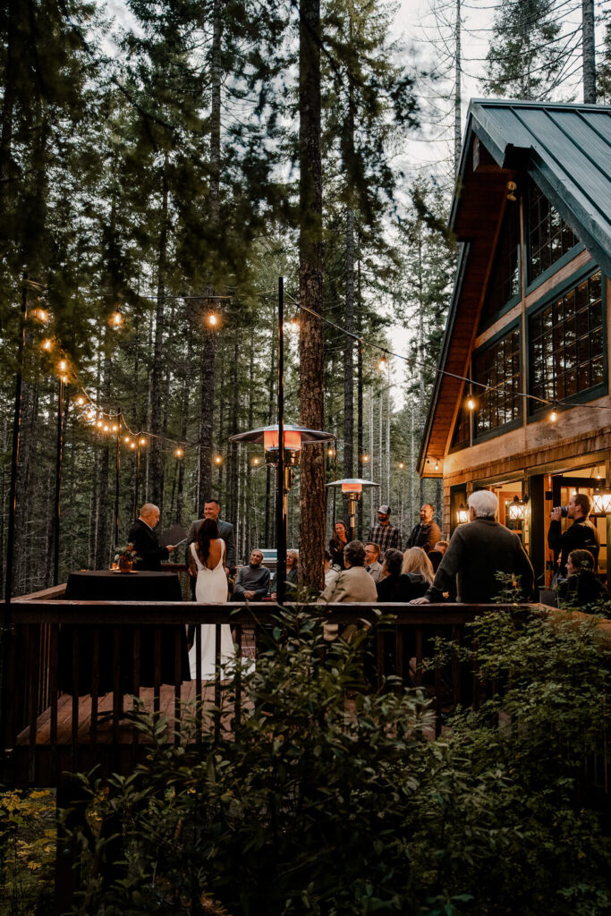 Couple gets married on a deck in the woods for an oregon wedding