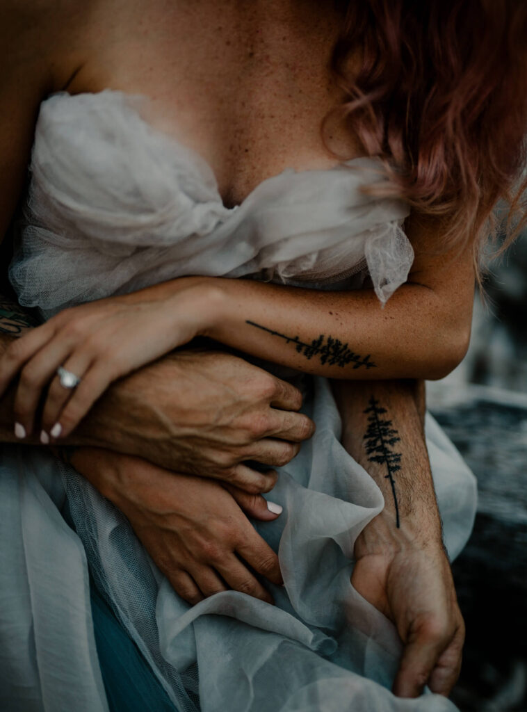 Close up of couples hands at a mount rainier elopement