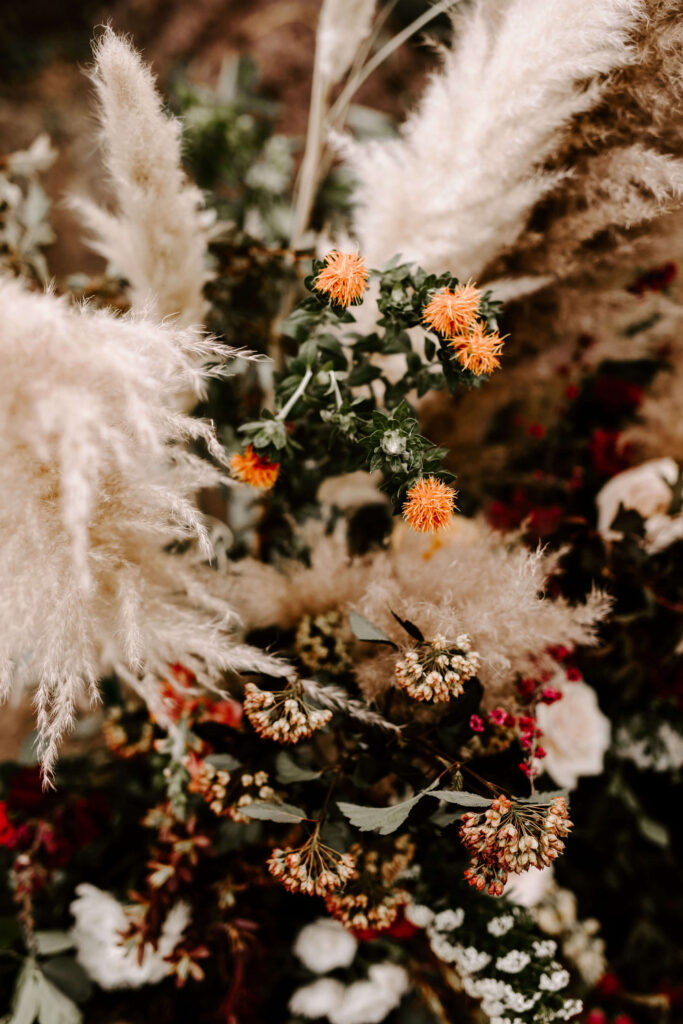 Flowers and pampas grass at a smith rock elopement in terrebonne oregon