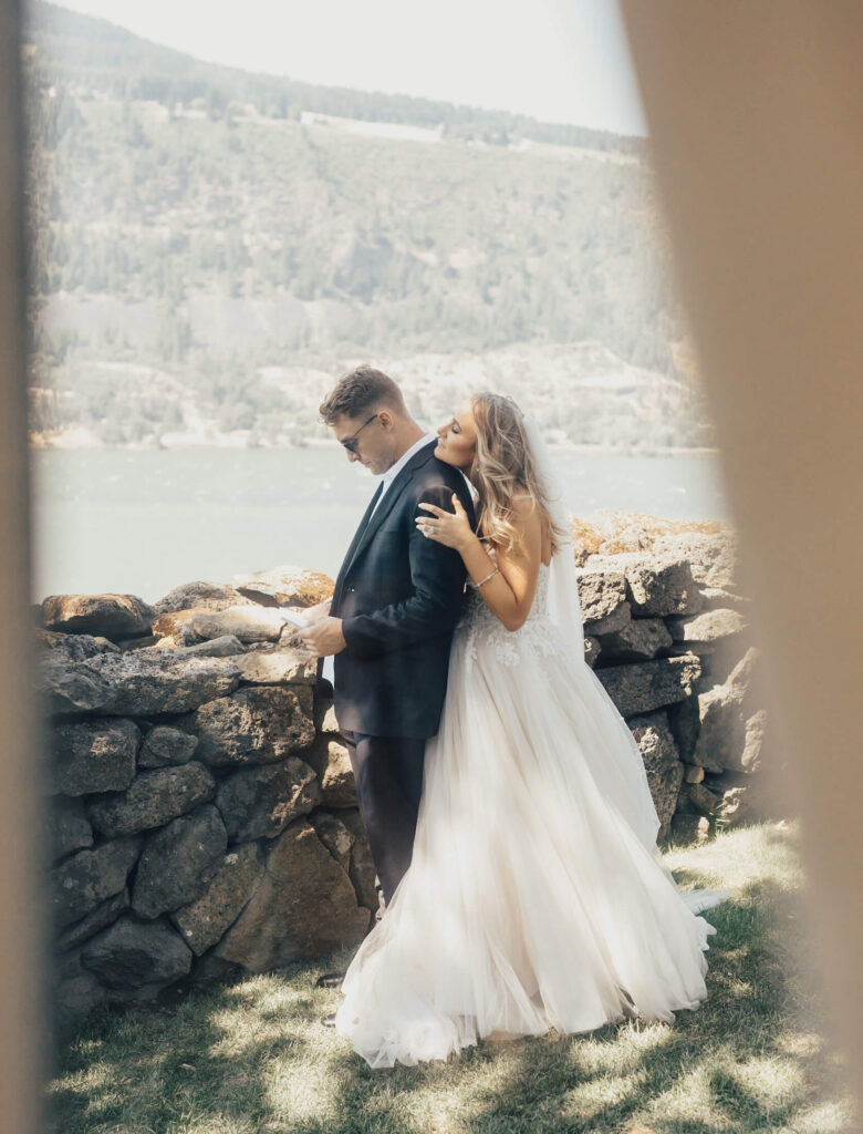 Couple exchanges private vows at their wedding at the Griffin house in Oregon.