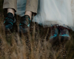 couple wearing hiking shoes for their elopement at smith rock