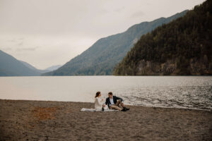 elopement picnic in front of lake at olympic national park lake