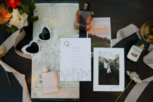 an up close of the elopement invitations and items from the special day