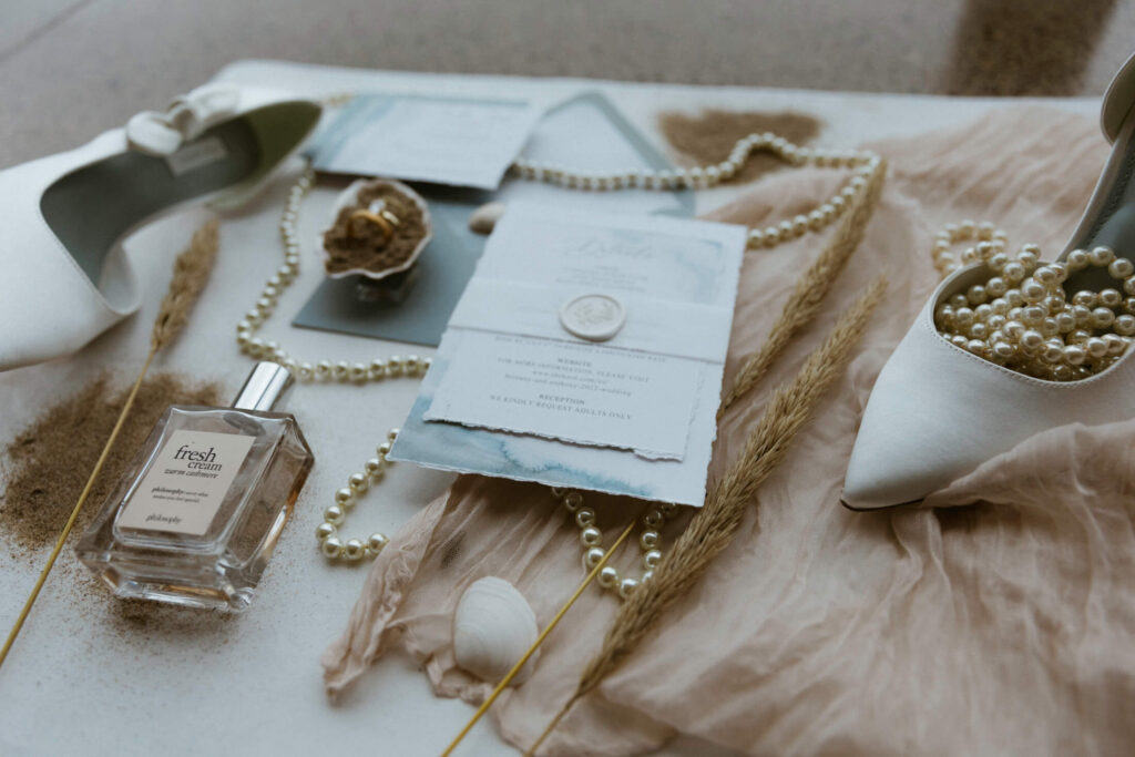 Luxury coastal flatlay for an oregon coast vow renewal