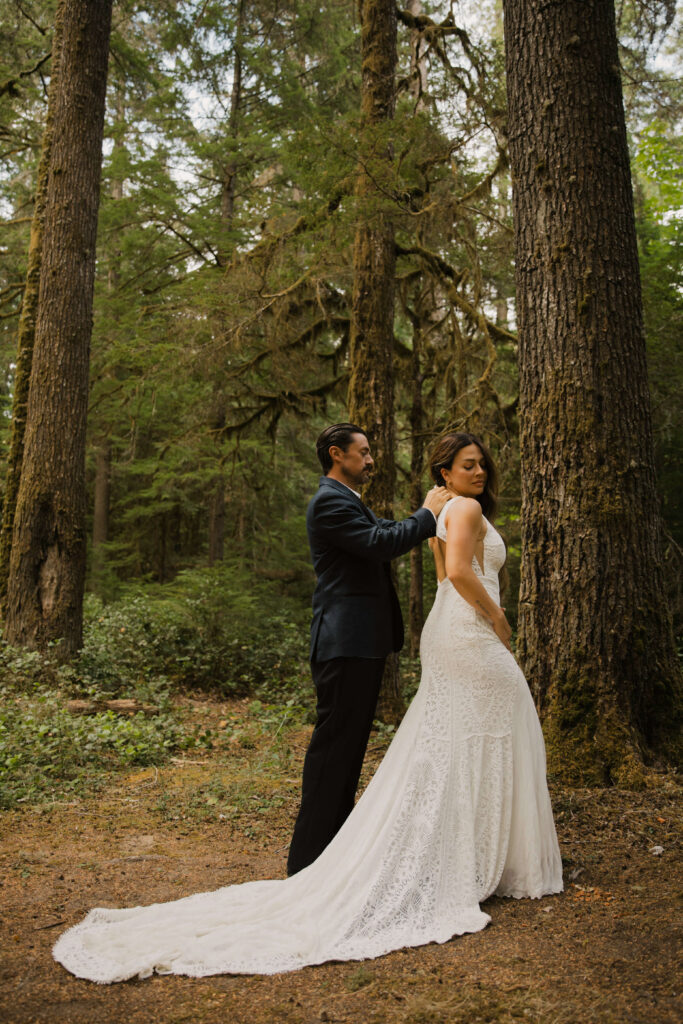 couple gets ready for their elopement at mount rainier national park